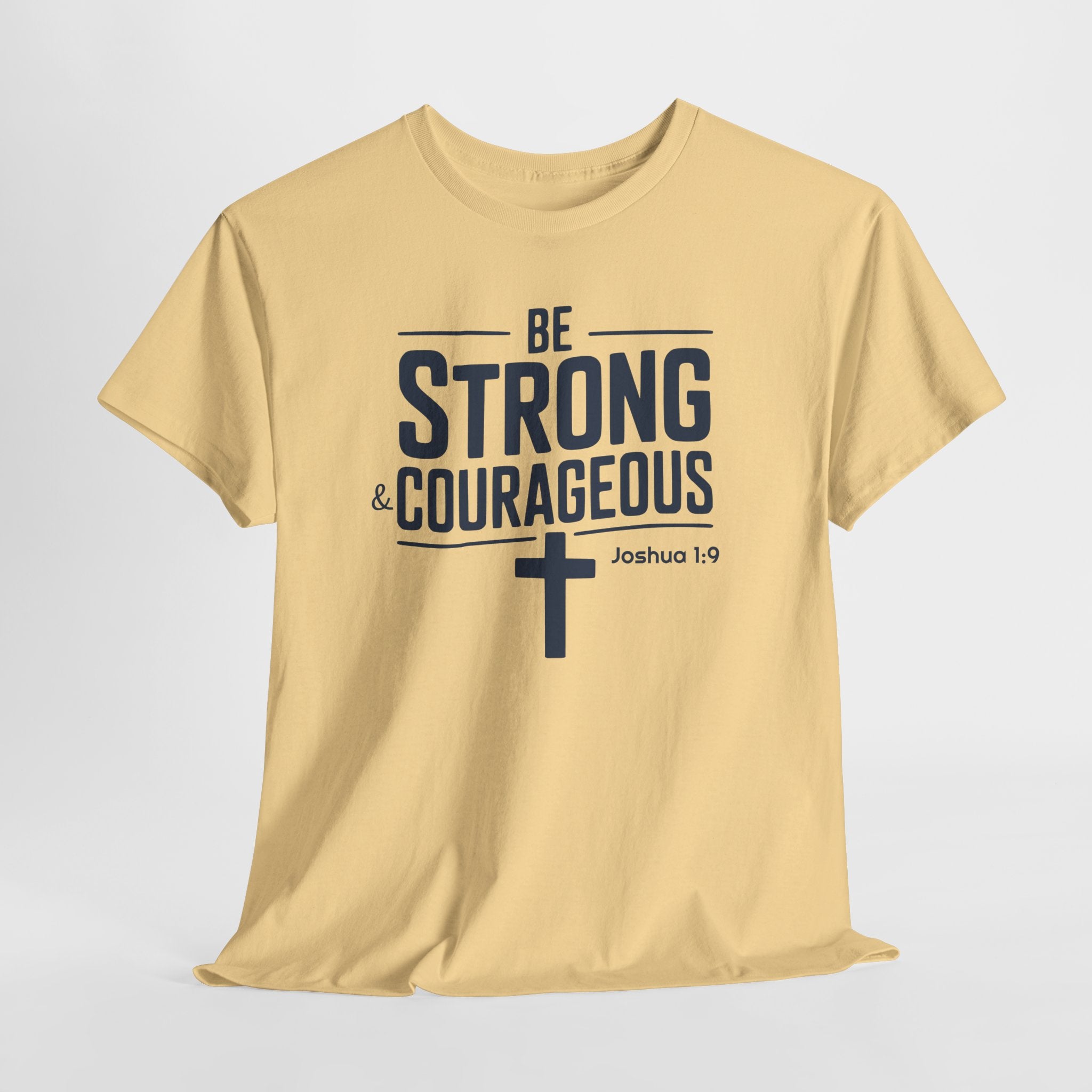 Beige t-shirt with 'Be Strong & Courageous' text and cross on a light gray background