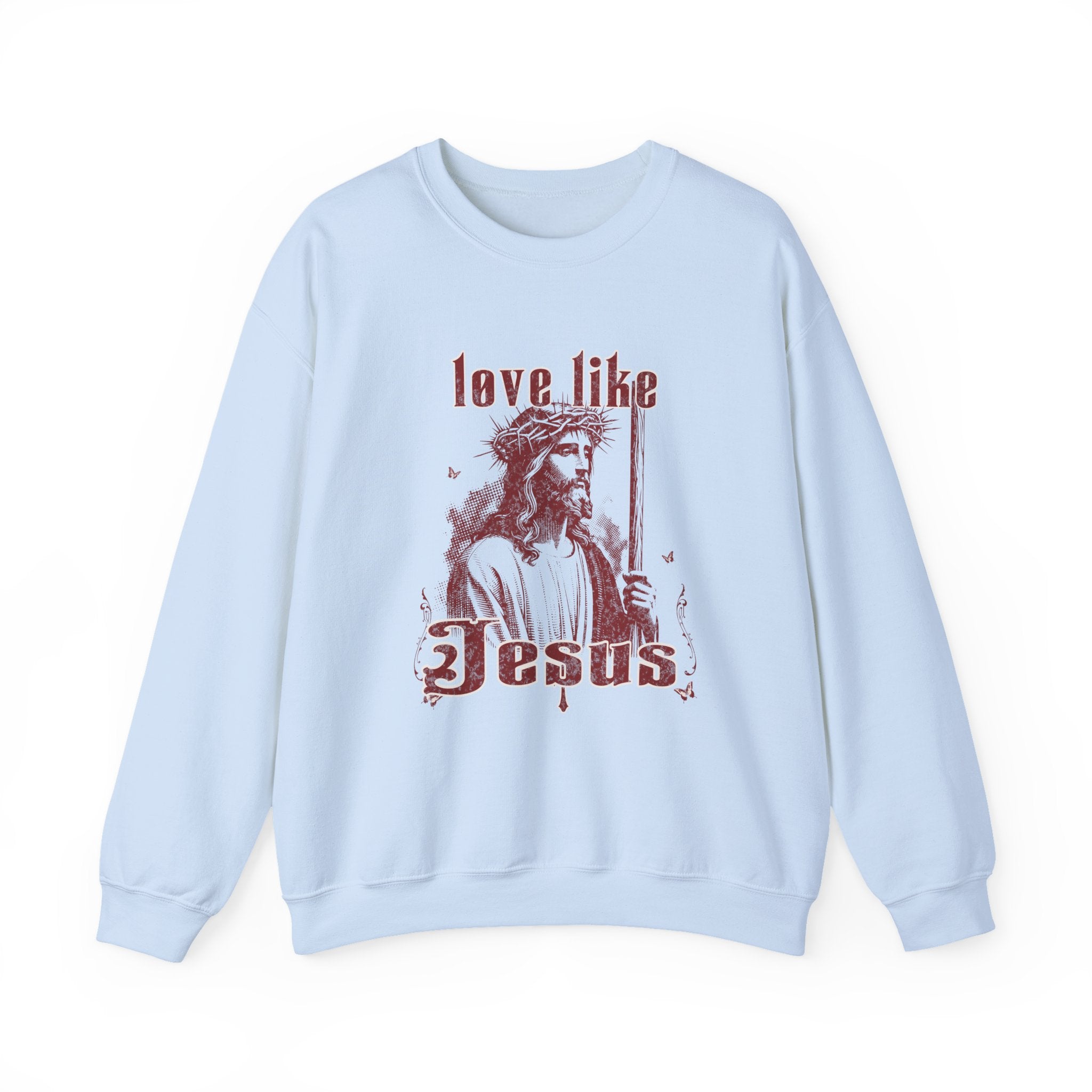 Light blue sweatshirt with a graphic of a religious figure and text on a white background