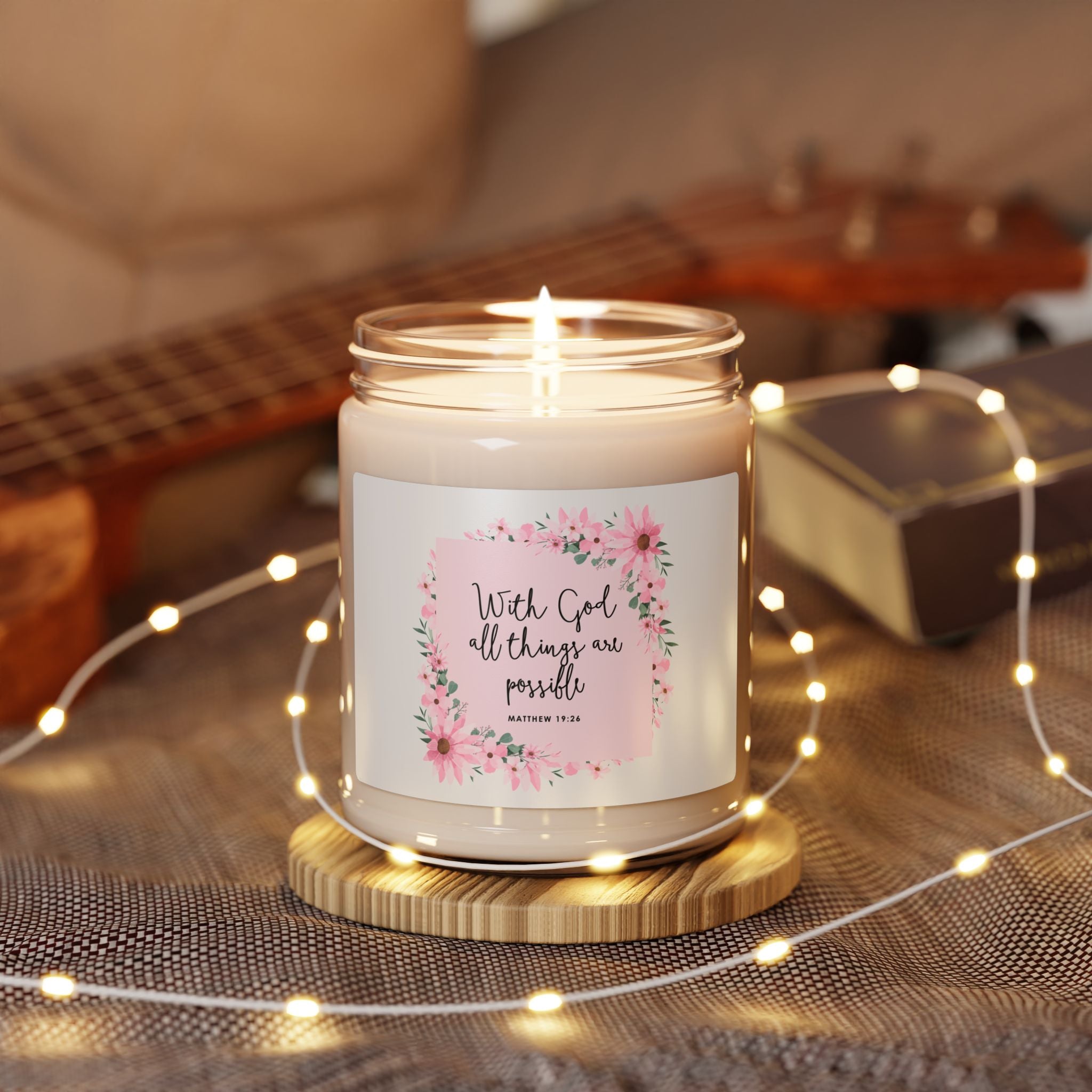 With God All Things Are Possible candle with pink floral label
