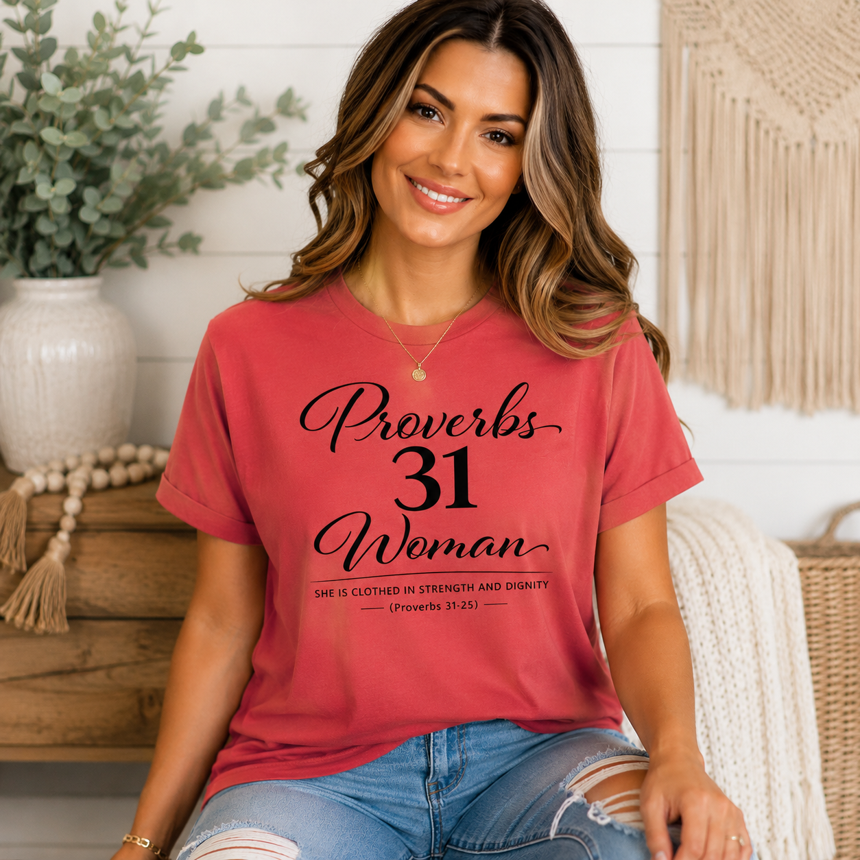 Woman wearing a red 'Proverbs 31 Woman' t-shirt in a home setting.
